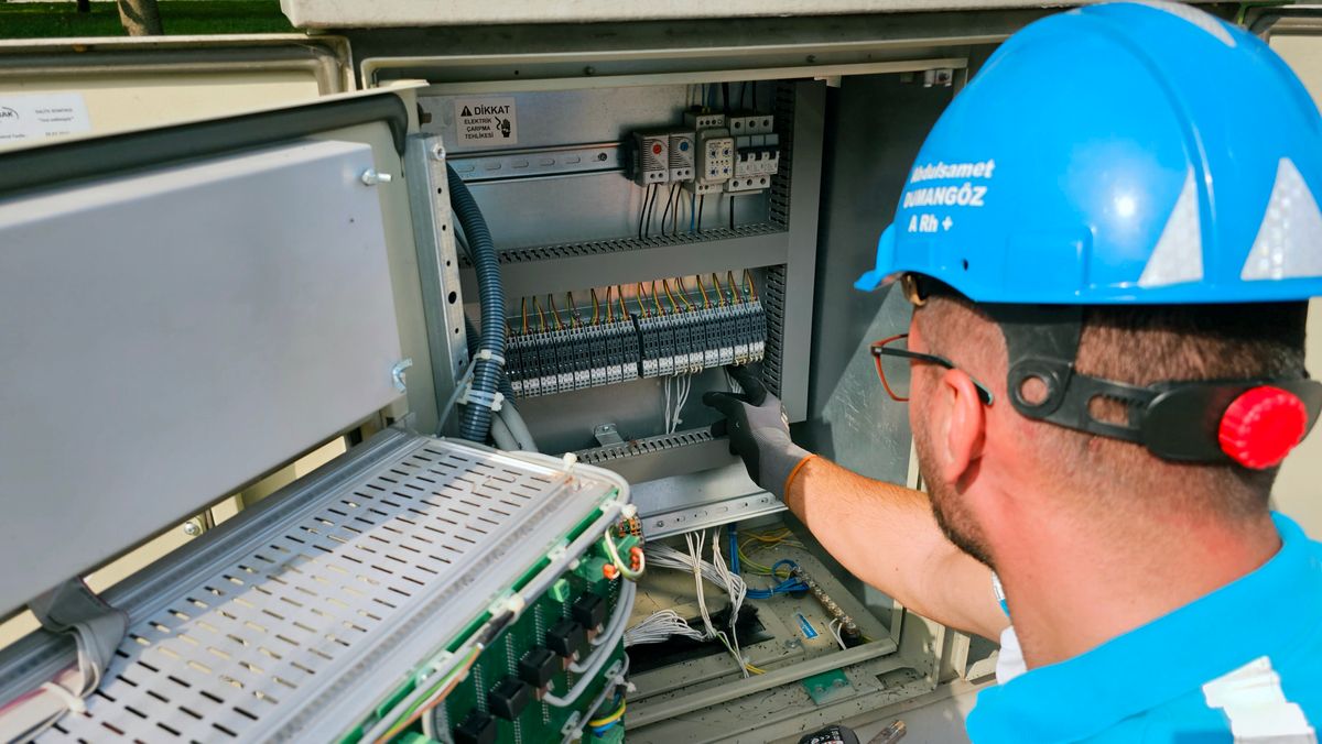 Electrical service professional at work